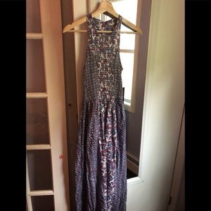 Brand new maxi dress. Semi open back